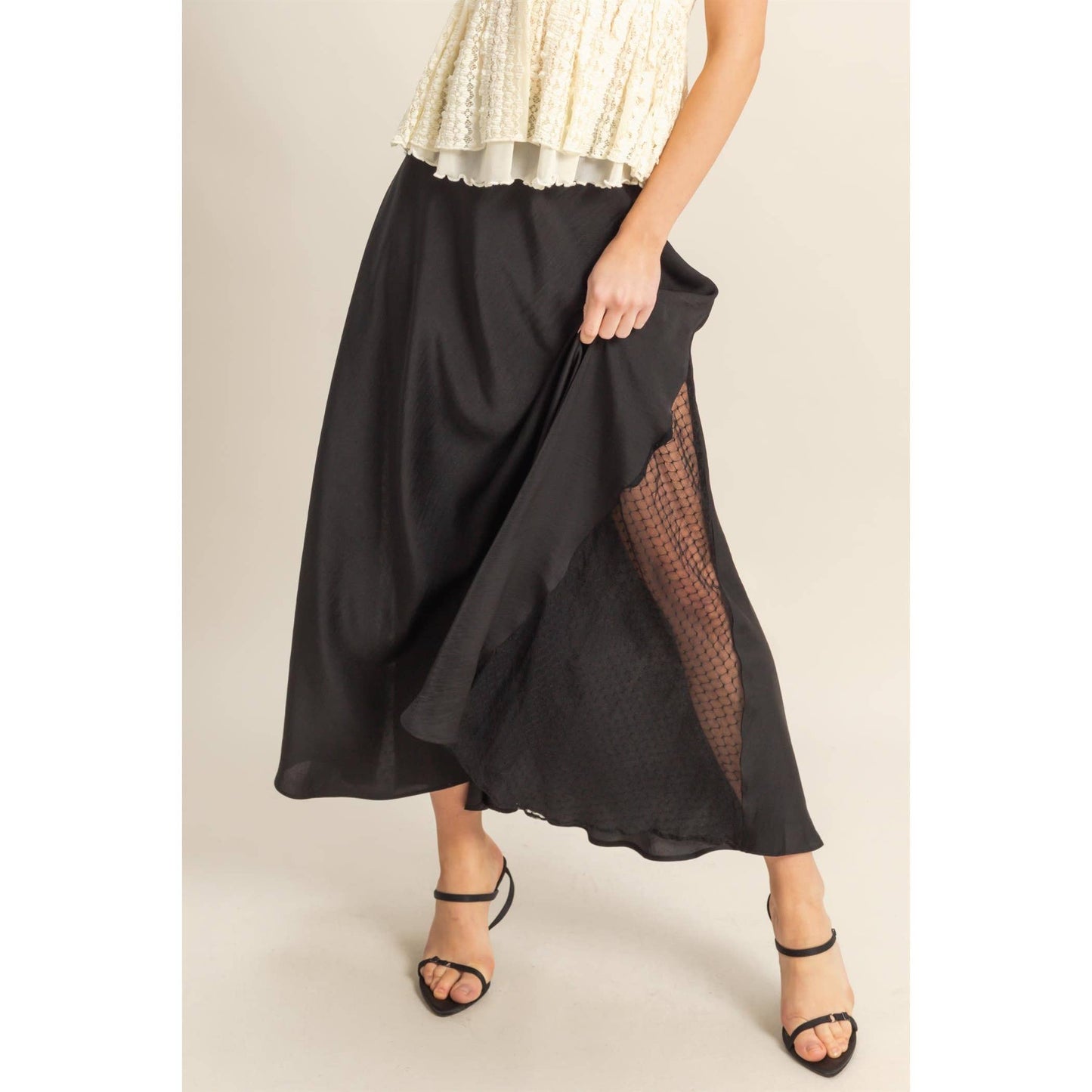 Flirty Lace Detail Satin Maxi Skirt features a mid-rise waist and flowy hem, perfect for summer styles.
