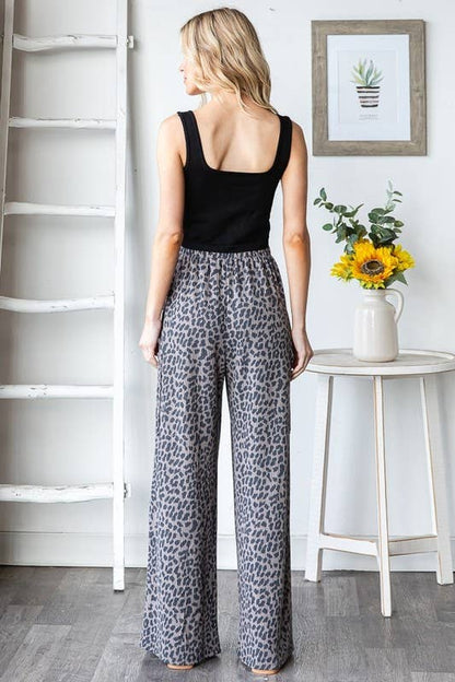 Wild Side Pants: leopard print, elastic waist, drawstring, side pockets, wide-leg pants on model wearing size small