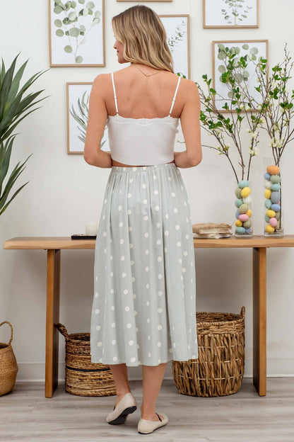 Stylish POLKA DOT BUTTON DOWN MIDI SKIRT with elasticized back waist, perfect for casual outings or summer days.