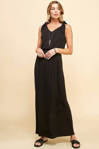Stylish Lady in Red Dress showcases a flattering smocking waistband for a timeless, comfortable look at [Brand Name].