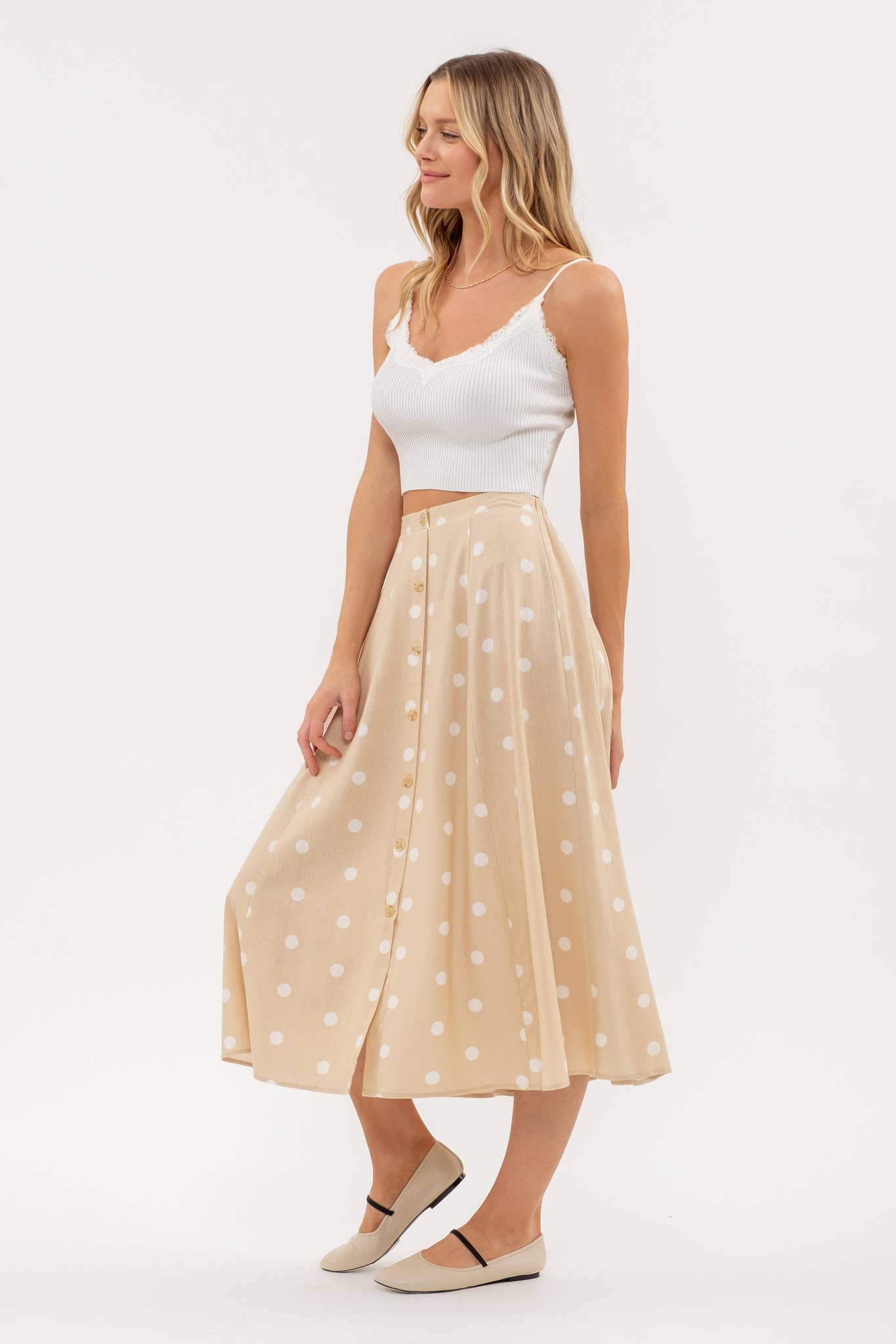 Stylish POLKA DOT BUTTON DOWN MIDI SKIRT features elasticized back waist and non-functional buttons for a chic look.
