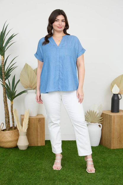 Stylish PLUS BACK BUTTON CUFF SLEEVE CHAMBRAY TOP featuring a split neckline and pocket detail, perfect for casual wear.