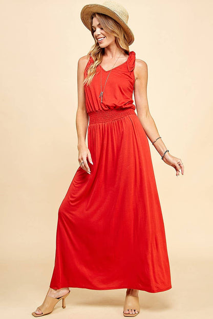 Stylish Lady in Red Dress featuring a smocked waistband for a flattering fit, perfect for any occasion.