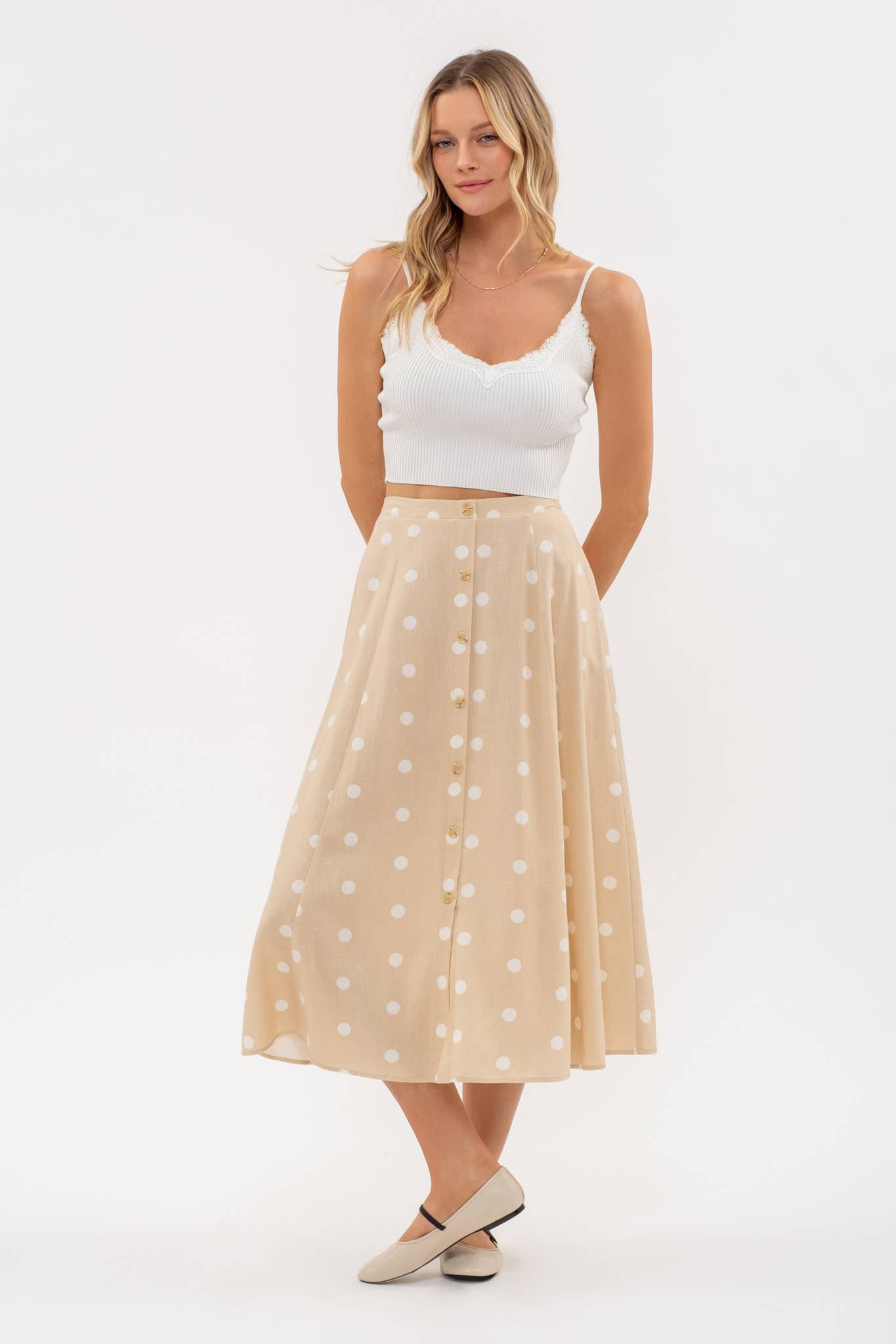 Stylish POLKA DOT BUTTON DOWN MIDI SKIRT with elasticized back waist, perfect for a chic, casual look.