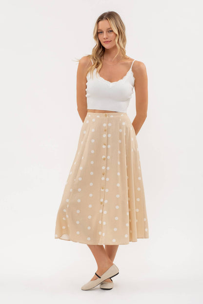 Stylish POLKA DOT BUTTON DOWN MIDI SKIRT with elasticized back waist, perfect for a chic, casual look.