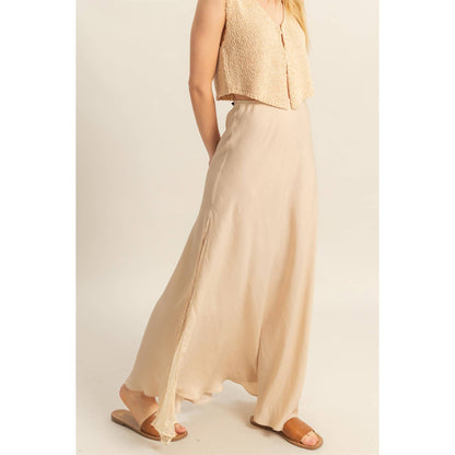 Lace Detail Satin Maxi Skirt offers a flirty summer look with a flowy hem and lace side panel. Perfect for warm days!