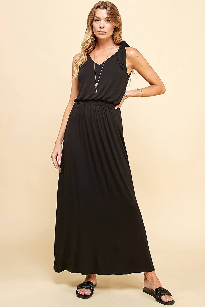 Chic Lady in Red Dress showcasing a flattering smocking waistband, perfect for style and comfort at your favorite store.
