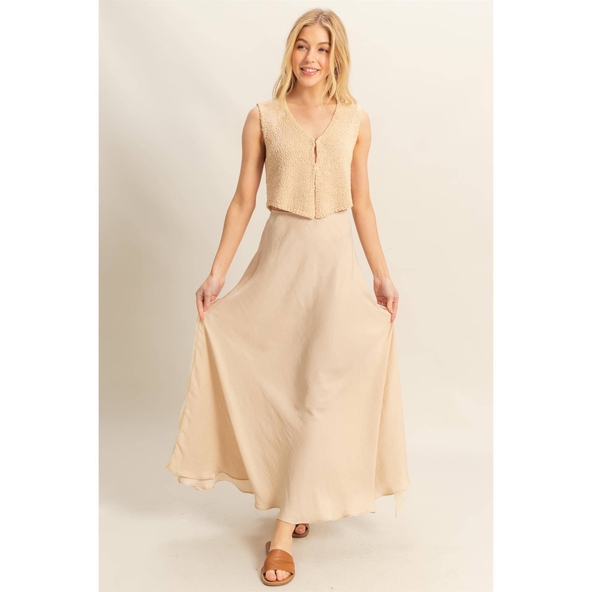 Lace Detail Satin Maxi Skirt adds flirty elegance to summer outfits with its flowy design and lace panel accent.