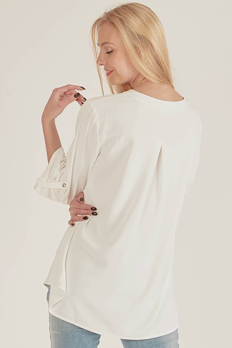 Stylish Pocket Blouse with a front pocket and loose fit, perfect for versatile everyday wear at your favorite store.