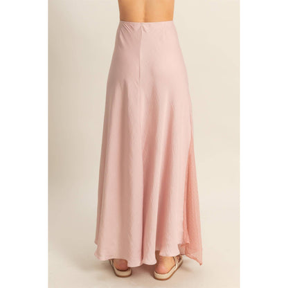 Lace Detail Satin Maxi Skirt features a flowy hem and lace panel, perfect for adding a flirty touch to summer outfits.