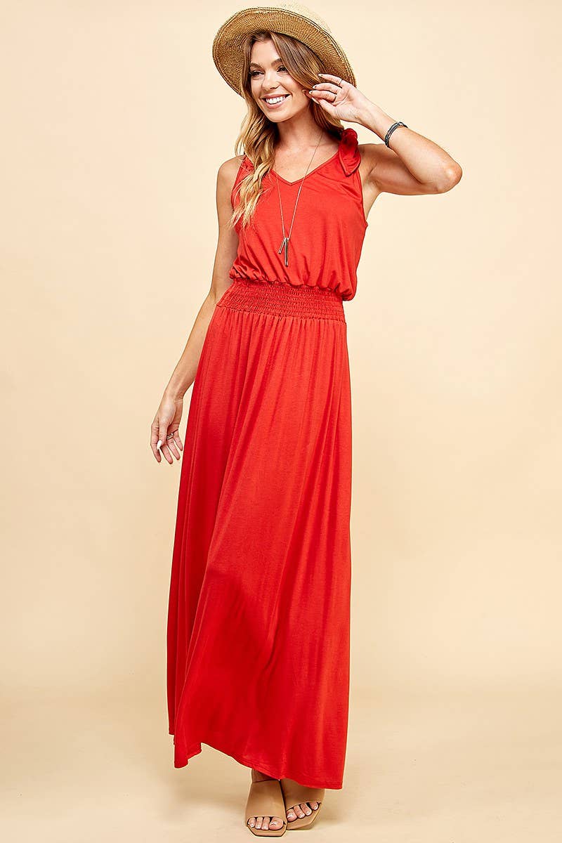 Stylishly flaunting a smocked waist, the Lady in Red Dress offers comfort and timeless elegance for any occasion.