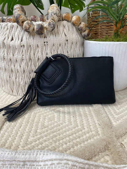 Stylish Leather Wristlet/Clutch featuring zip closure, credit card slots, and a chic braided handle for a fun accessory.
