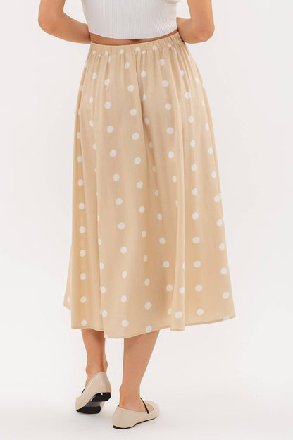 Stylish POLKA DOT BUTTON DOWN MIDI SKIRT with elasticized back, perfect for casual or dressy occasions.